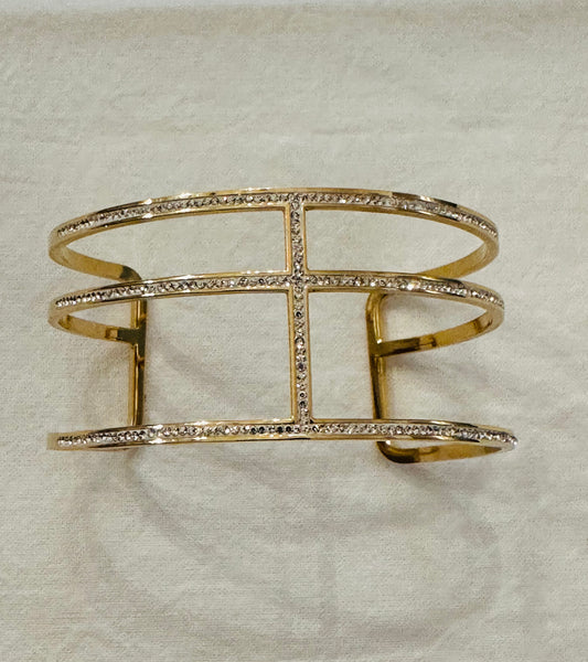 Open cross cuff